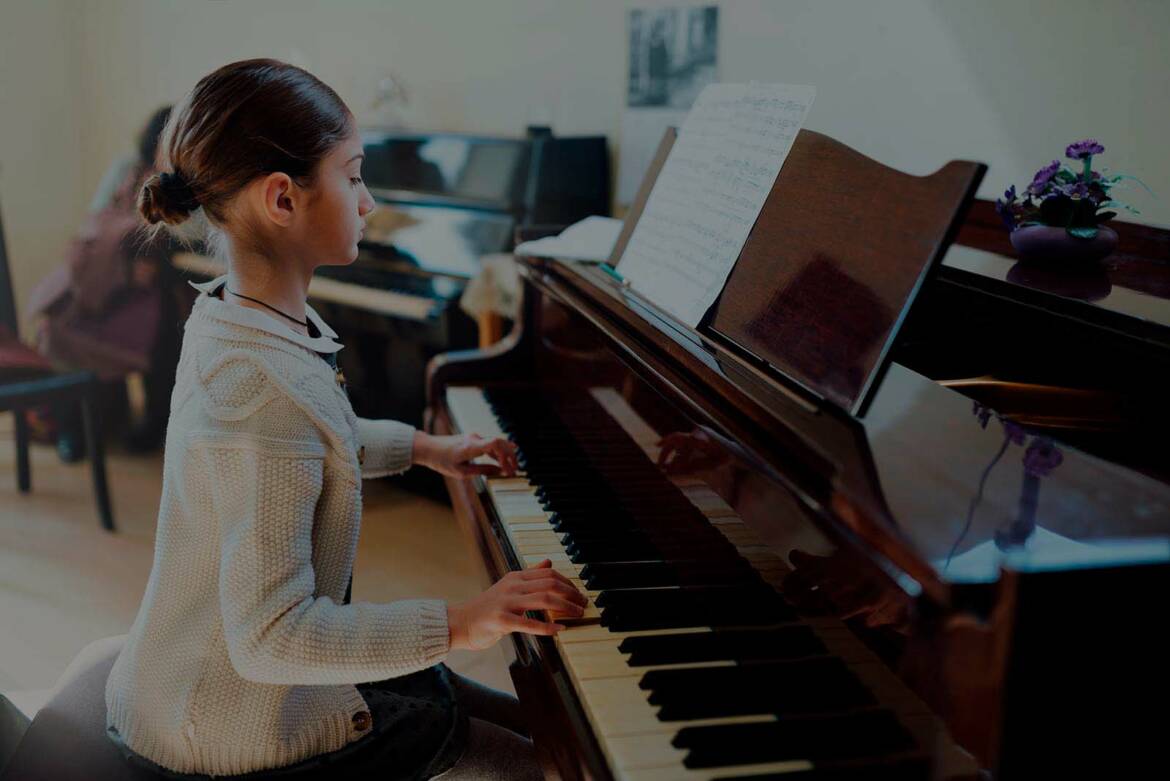 good-student-plays-piano-at-a-music-school-2021-08-26-16-00-31-utc.jpg